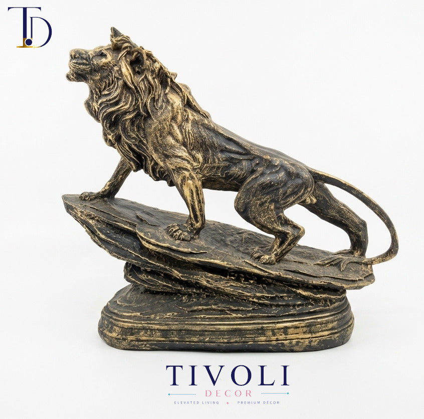 Antique golden lion on a rocky ridge statue by Tivoli Decor, a premium abstract decoration piece displayed on a white background for stores in Pakistan.