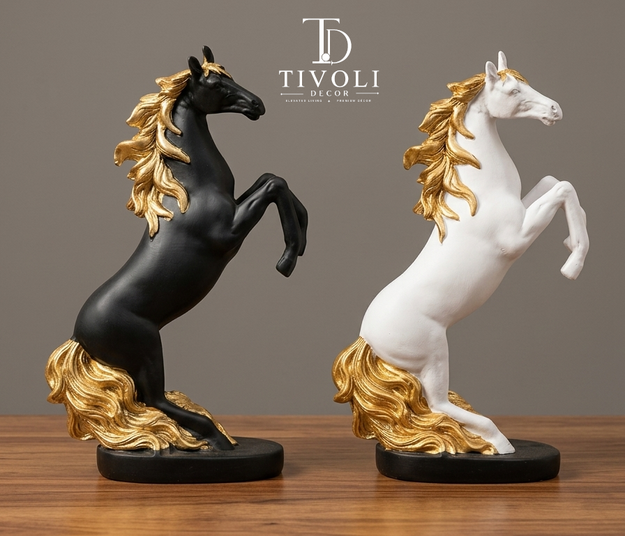 "Black and white rearing horse statues with gold mane and tail on wooden table – Tivoli Decor"