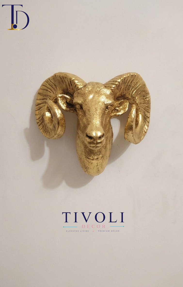 Luxury metallic golden ram head 3D wall sculpture by Tivoli Decor, a premium abstract decoration piece for living room accent walls in Pakistan.