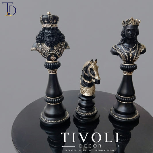 Luxury king, queen, and knight black and gold chess statue set by Tivoli Decor, a premium abstract table decoration piece for executive offices in Pakistan.