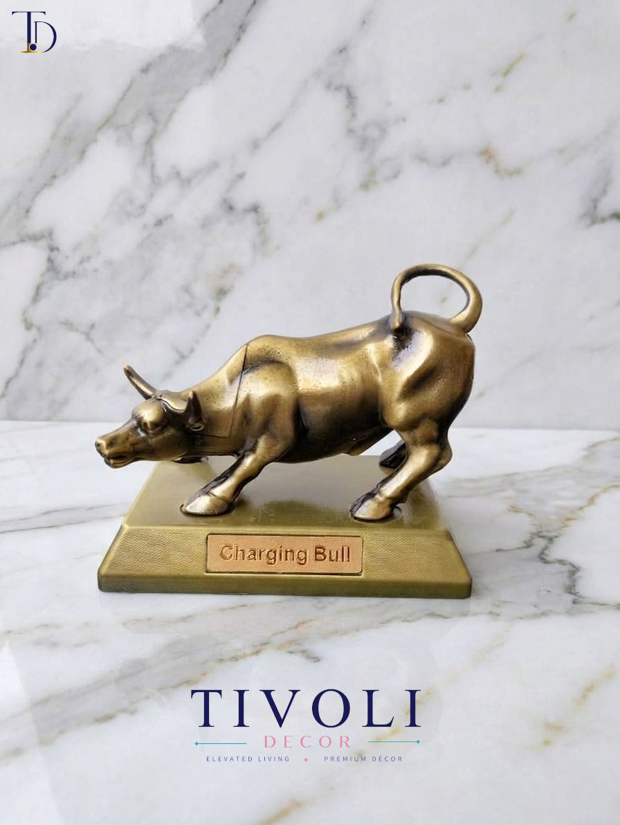 Wall Street charging bull brass statue with a gold nameplate by Tivoli Decor, a premium luxury office desk decoration piece in Pakistan.