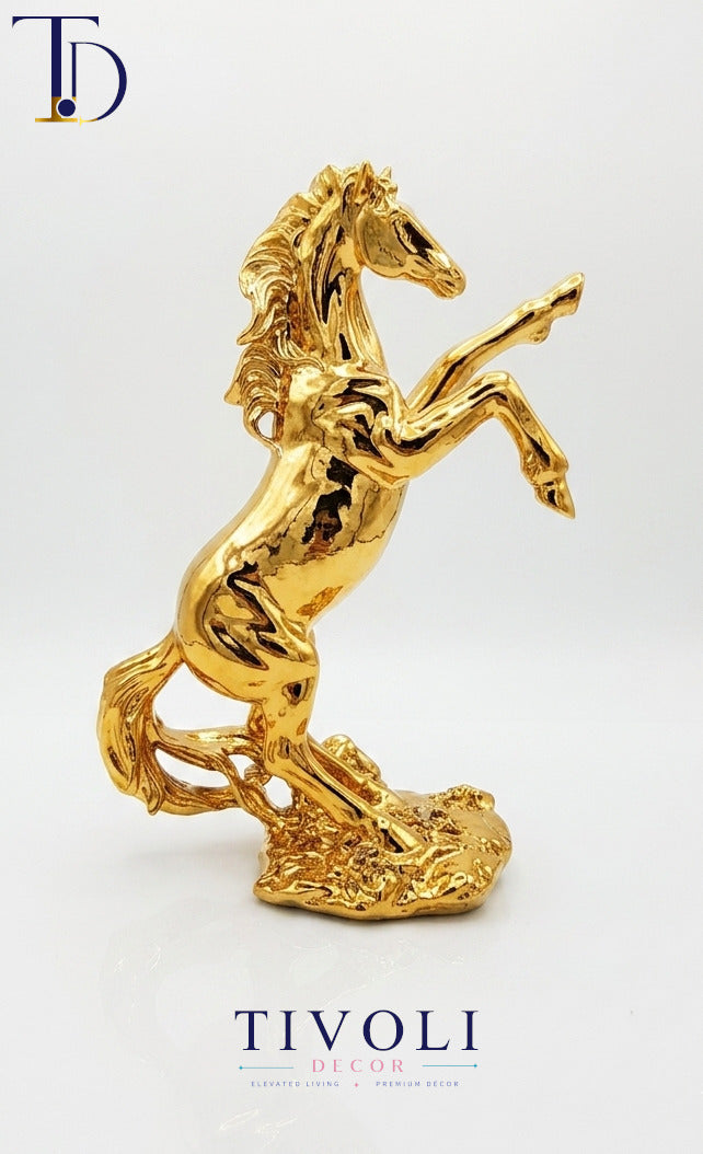 Luxury high-shine golden rearing horse statue by Tivoli Decor, a premium abstract equestrian decoration piece for living room tables in Pakistan.