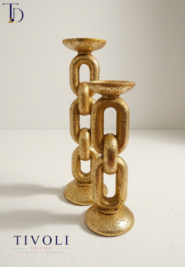 Luxury metallic golden interlocking chain candlestick holders by Tivoli Decor, a premium abstract decoration piece for living room mantles in Pakistan.