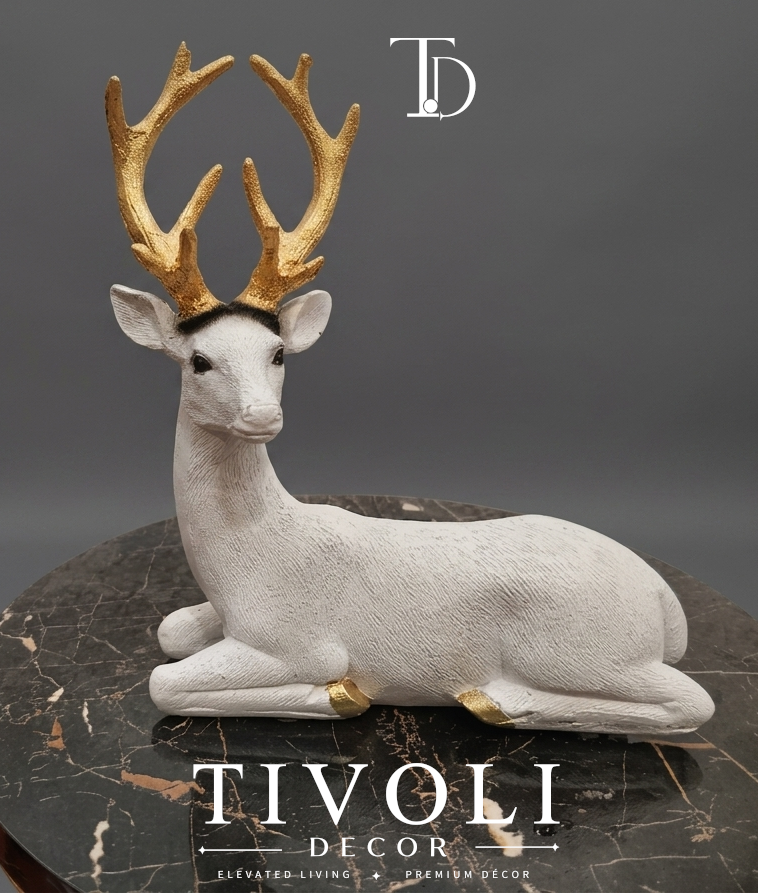 White resting deer sculpture with gold-finish antlers and hooves - Tivoli Decor Pakistan