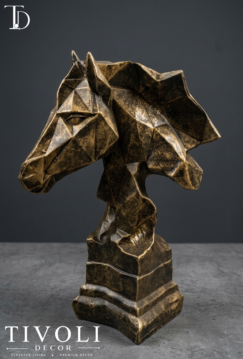 Geometric golden horse head statue by Tivoli Decor, a premium abstract decoration piece for living room console tables in Pakistan.Close-up of the antique metallic gold finish on the 3D faceted geometric horse sculpture from Tivoli Decor.