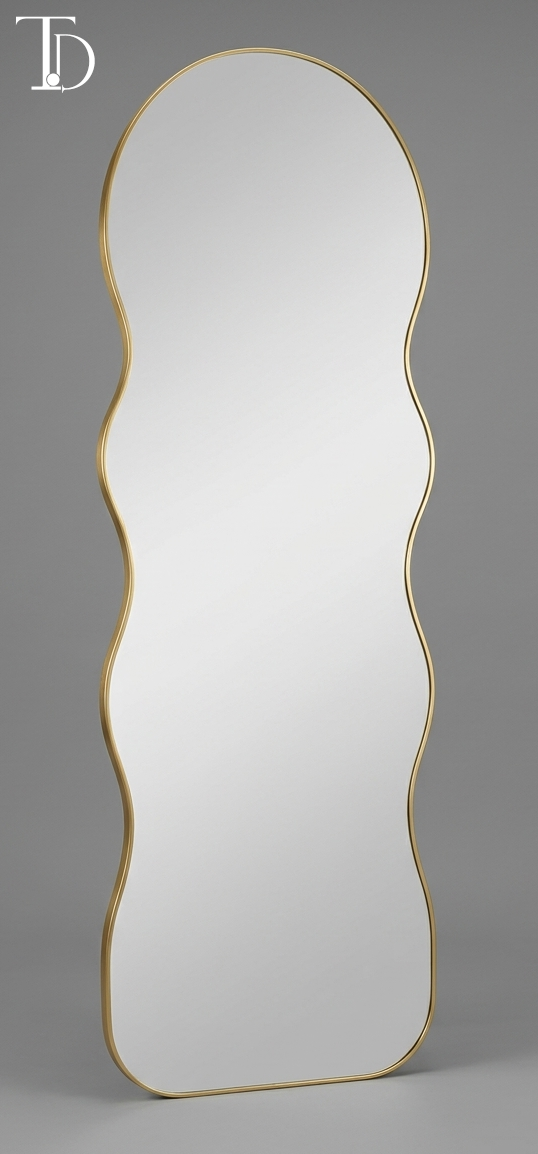 Branded Tivoli Decor modern wavy full-length floor mirror featuring an irregular asymmetrical silhouette with a slim brushed gold metal frame.