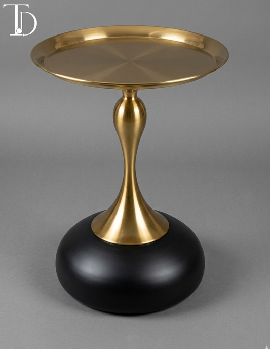Tivoli Decor luxury pedestal accent table featuring a full brushed gold tray top, gold hourglass stem, and a solid black dome base on a grey background.
